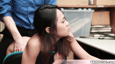 Cute and pretty faced half asian shoplifter chick caught by a horny old security guard